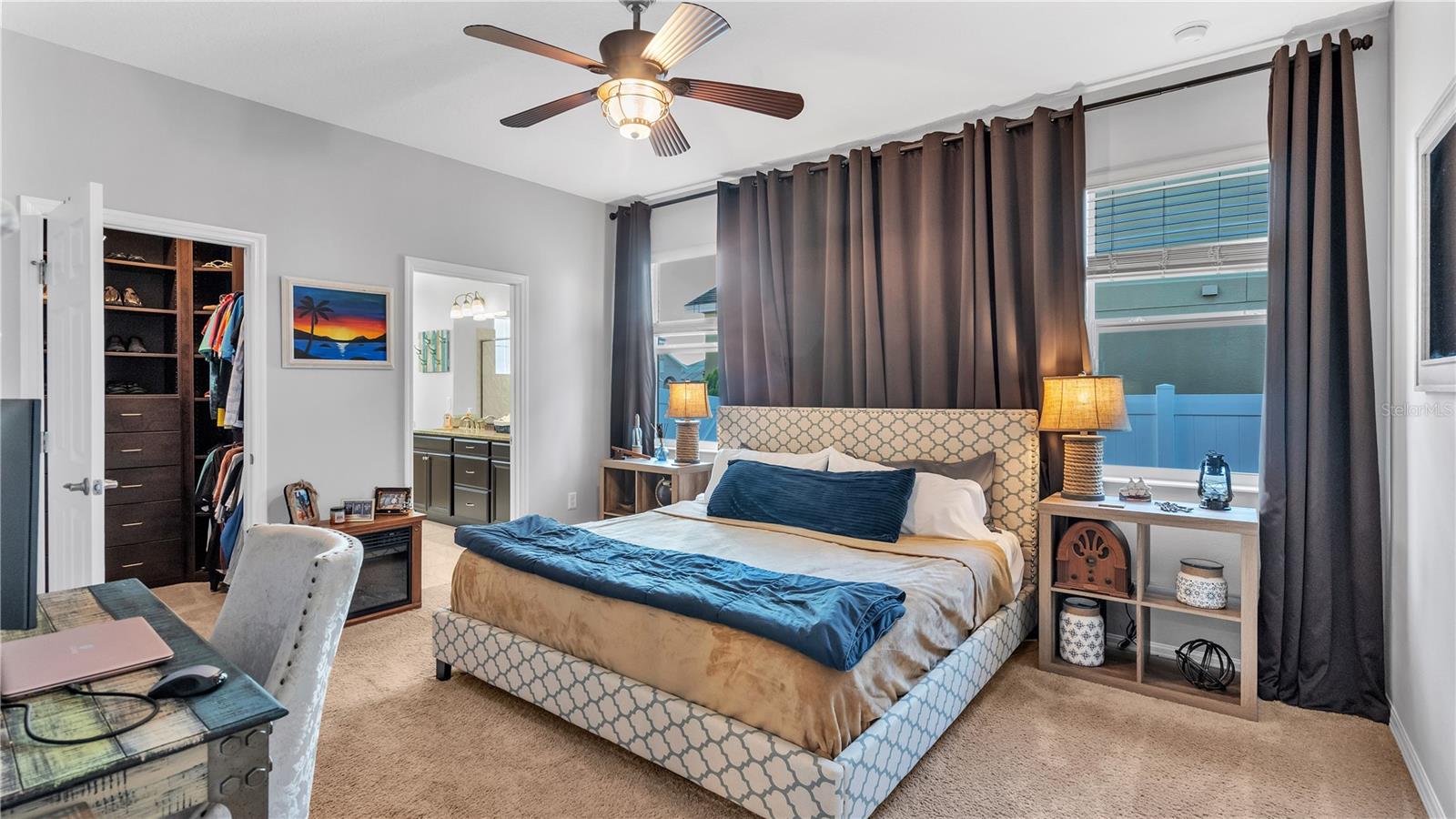 The private master suite features a large bedroom and includes a private ensuite bathroom with upgraded taller double vanities, soaking tub, and spacious walk-in shower, linen closet, and a separate toilet room.