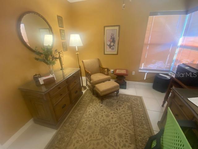 BEDROOM IS A FULLY SET UP OFFICE.