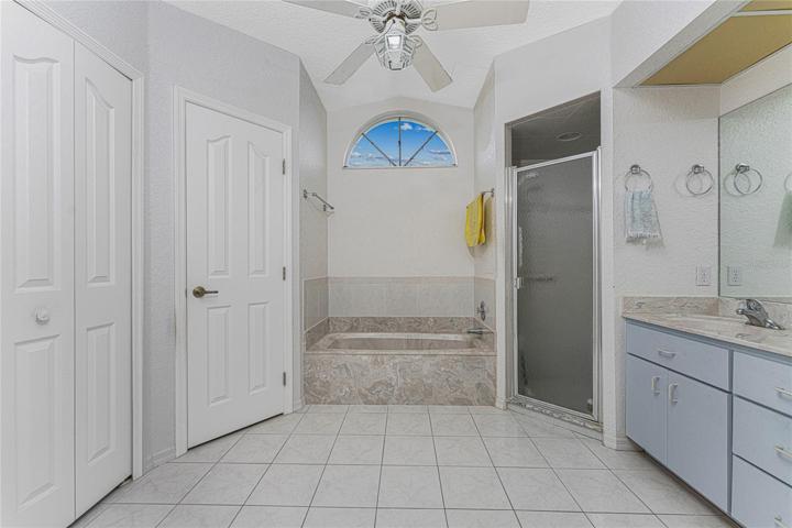 Master Bath features water closet, double sinks & large storage closet