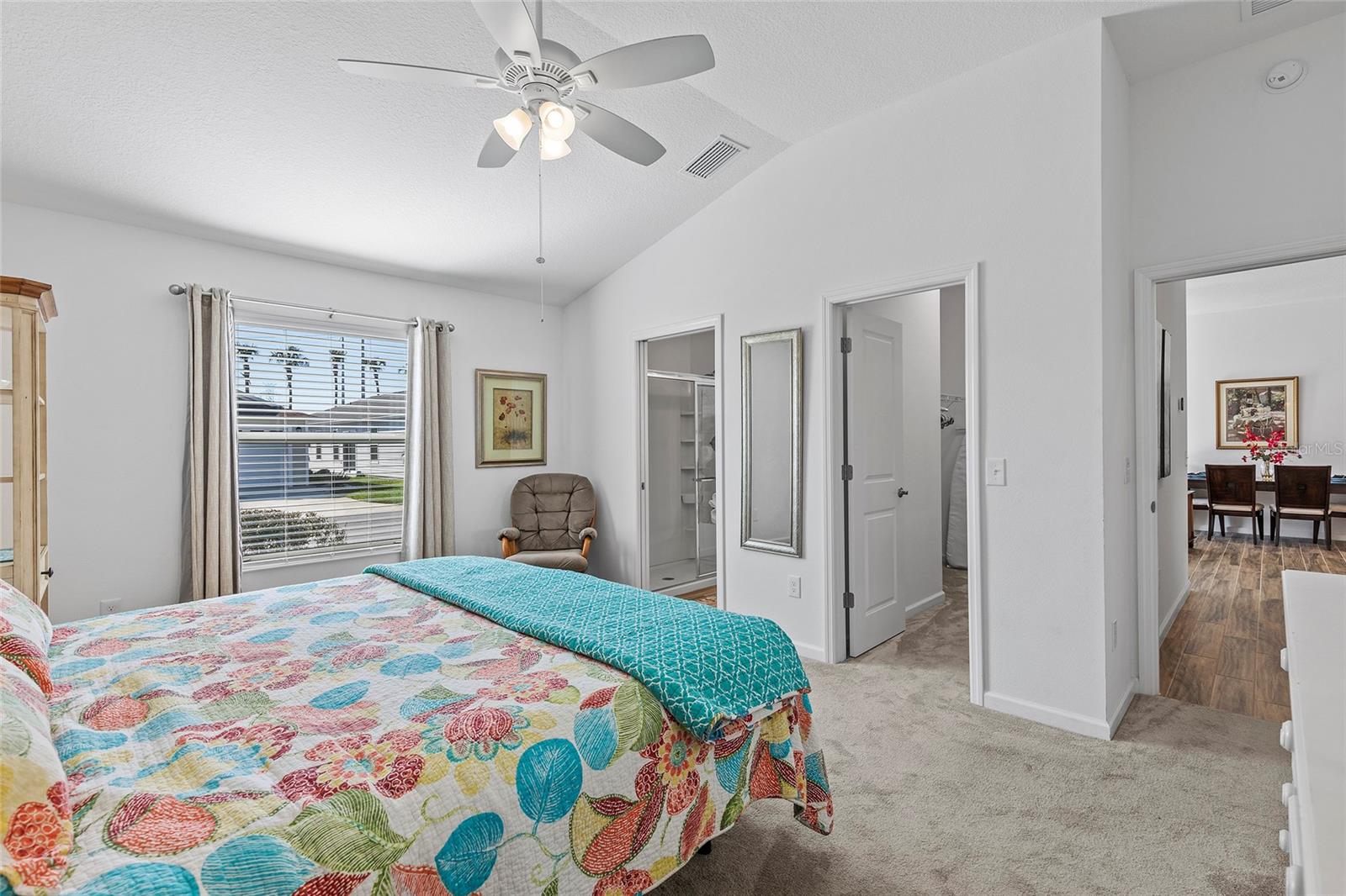 primary bedroom looking to bath and closet