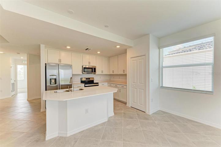 Bright open kitchen with additional light