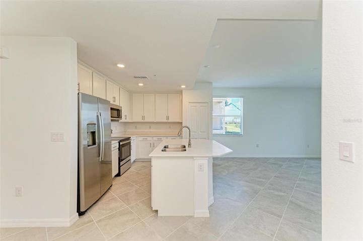 Kitchen opening to living room