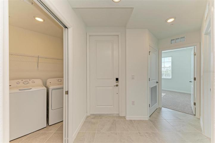 Front entrance and view of guest bedroom