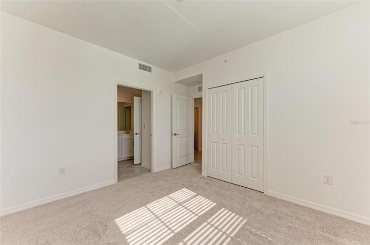 Large bedroom with views of the 18th hole.