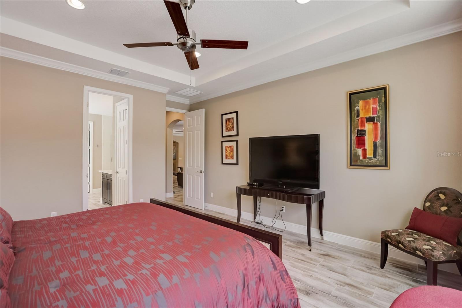 Master bedroom with door into family room and master bathroom