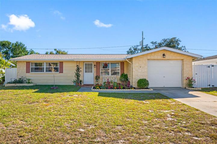 Pride of OWNERSHIP here! Welcome to 5544 Mosaic Drive in SUNNY Holiday, Florida.