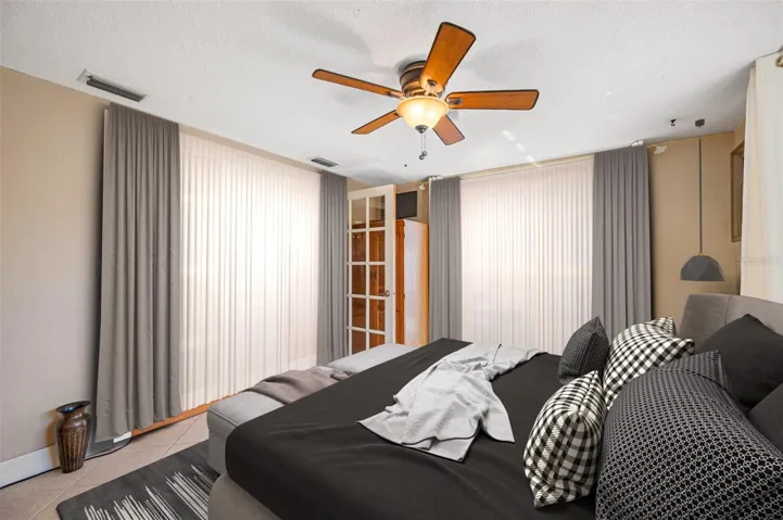 Currently being used as an office, this Bonus Room is an EASY 3RD Bedroom, with it's own Entrance.