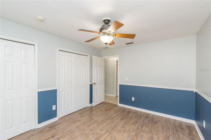 Bedroom 2 with dual closets