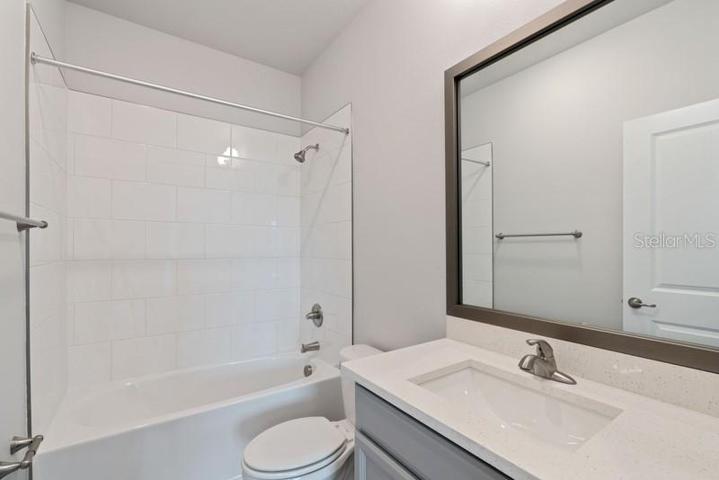 Bathroom Two **Photos are of a Similar Home