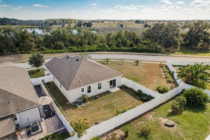 Aerial View Showing Large Lot and Fenced Yard
