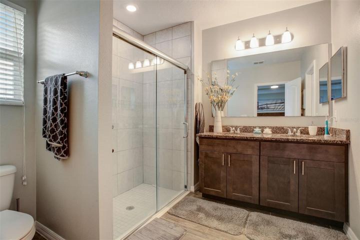 Primary Bath with Spacious Walk-in Shower and Dual Sinks
