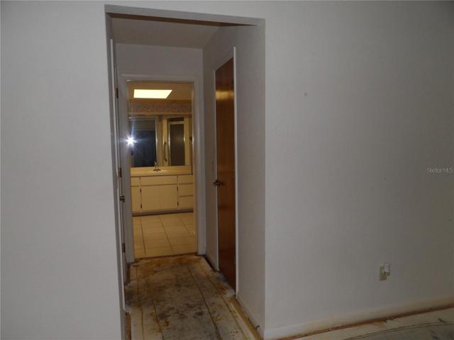 Double closets master bedroom looking into bathroom