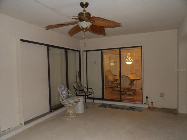 Lanai and sliding glass doors that open all the way into eat in kitchen and dining room areas