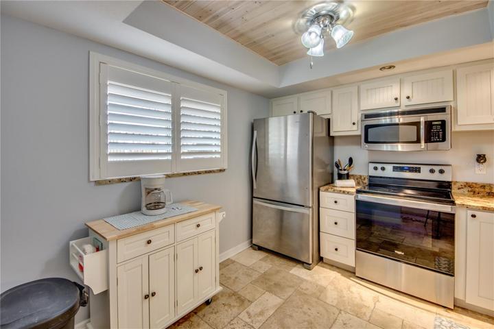 White beadboard cabinets