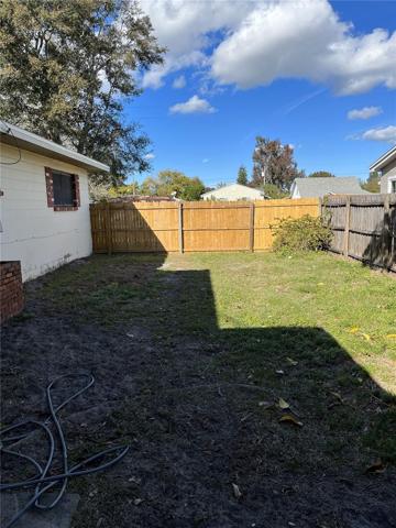 Side yard - cars have been removed
