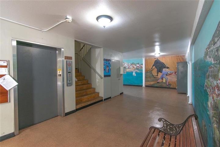 Elevator, stairs,storage, ,mailboxes,center entry