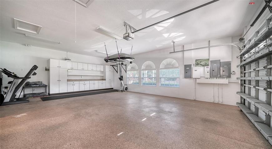 Attached 2 car garage with built in storage.
