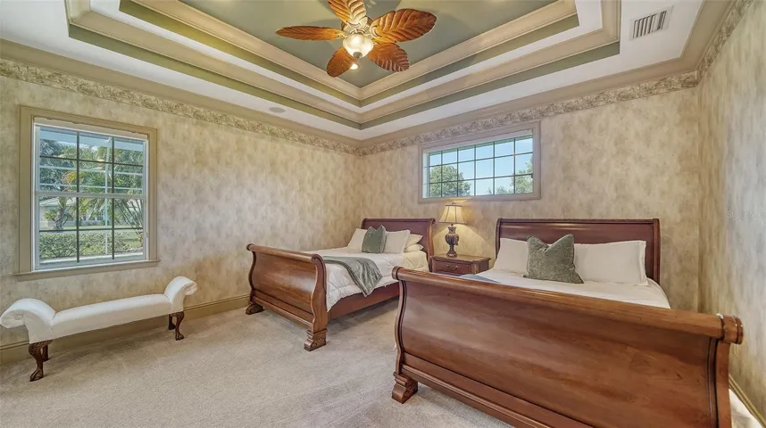 Owner's suite with tray ceiling and lots of natural light.