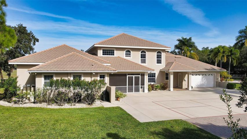 2-car attached garage and private pickleball court.
