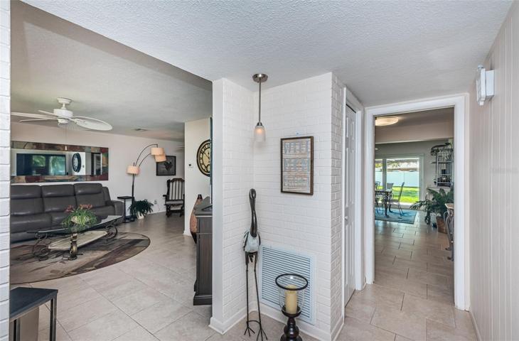 Foyer with painted brick accents