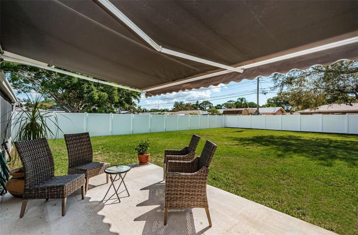 Backyard patio with electric awning