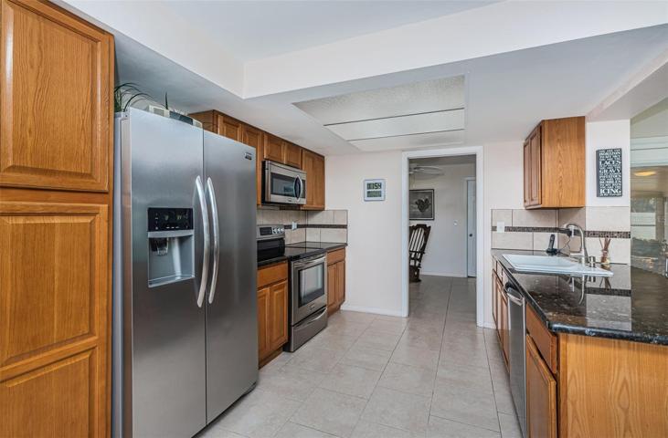 Kitchen with pocket door to Dining Room