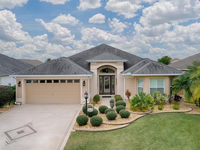 LOVELY 3/2 "LILY" DESIGNER HOME WITH PAINTED DRIVE AND WALKWAY LOCATED IN THE VILLAGE OF CHARLOTE!