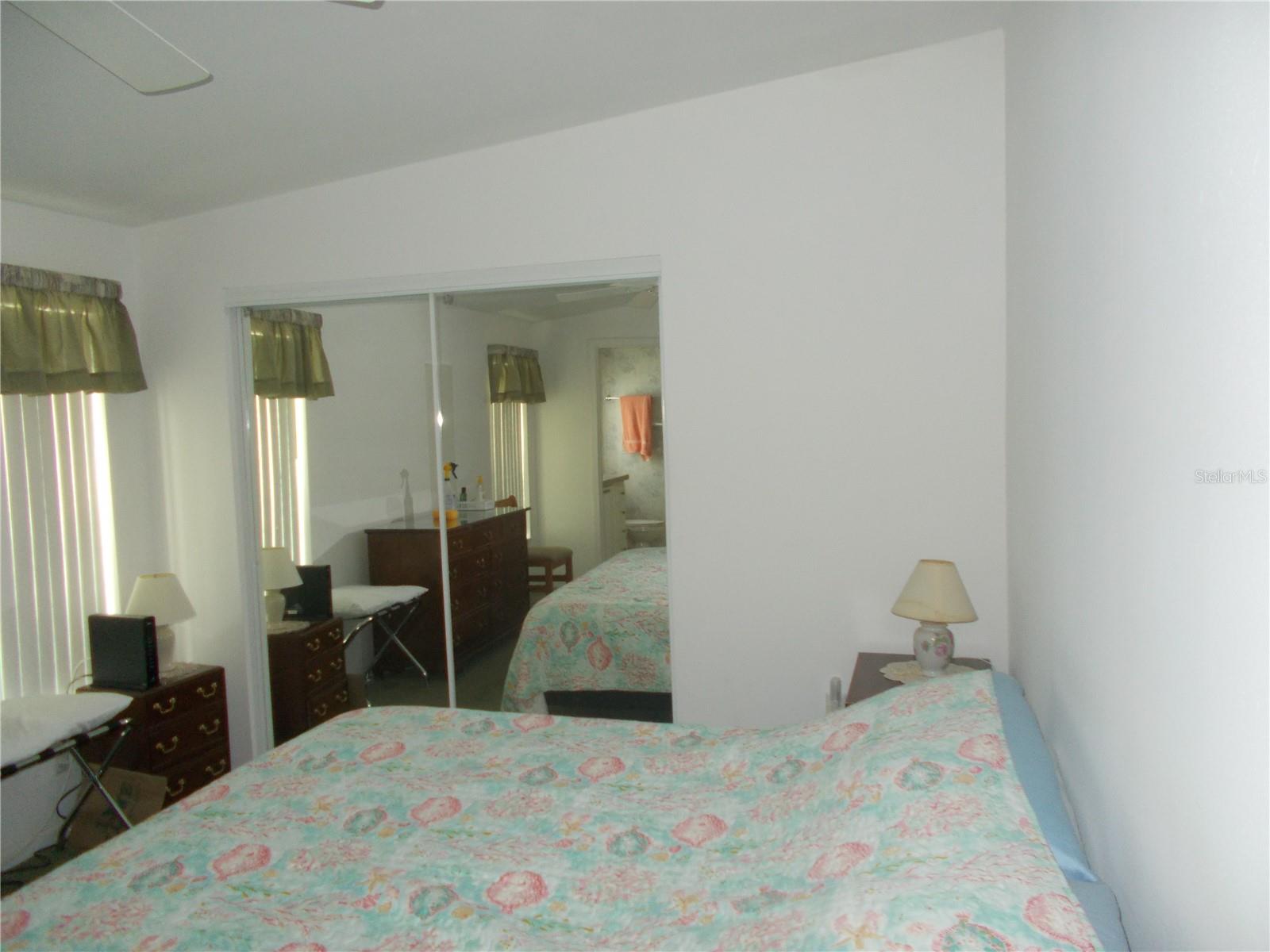 Master Bedroom with Double Mirrored Closet