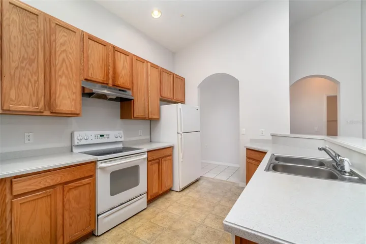 The wide-open kitchen provides ample storage space and the perfect setting for your culinary creativity to flourish.