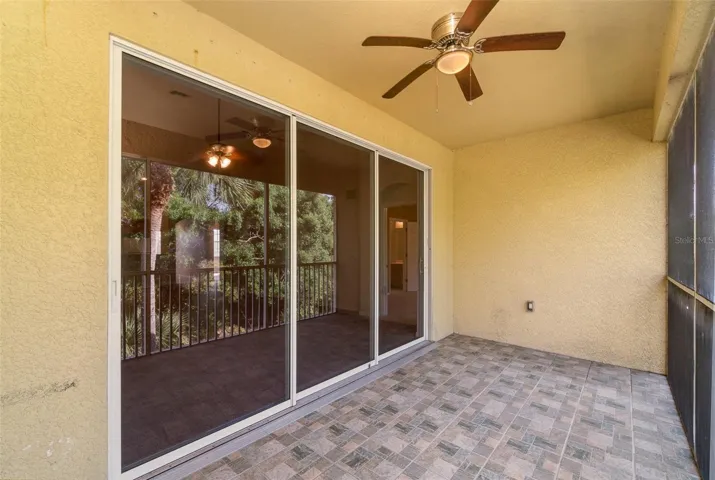 Expansive screened balcony that offers a stunning view of the serene private preserve.