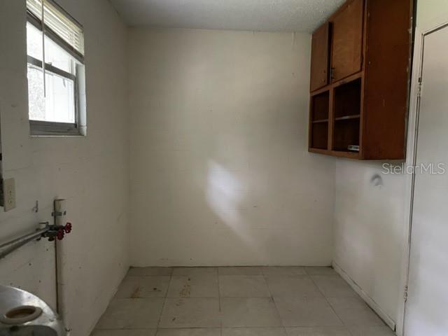 Utility room with hookup for washer and dryer