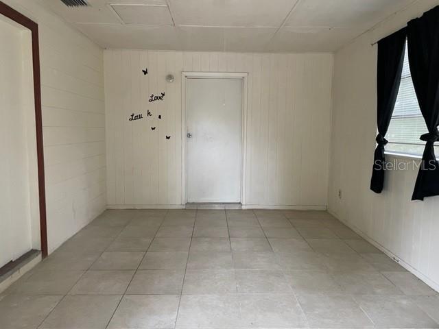 Could be used for an office/den.