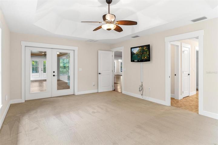 Primary Bedroom with French Doors to Lanai Area