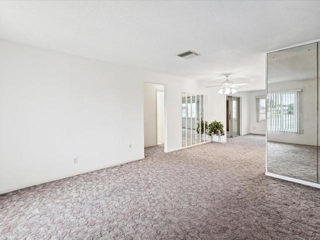 View from the front door, entrance to bedrooms, and dinging