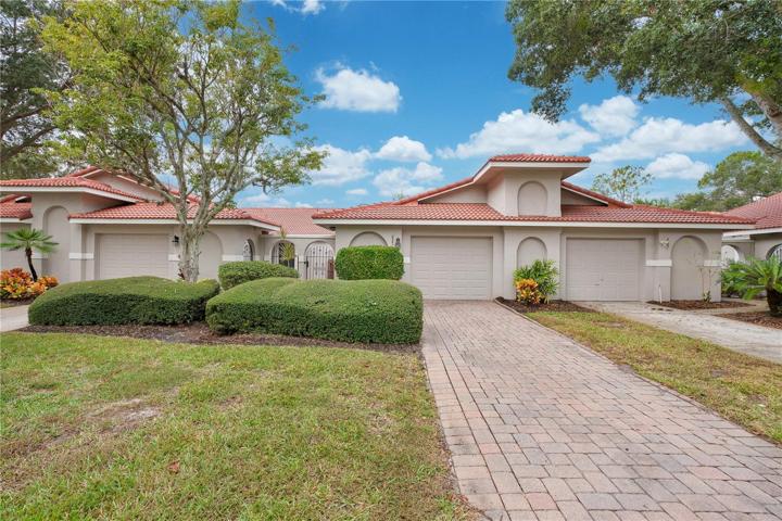 Welcome home to your single story Seville floor plan with an extended brick paver driveway