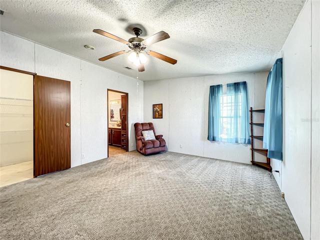 There is a large walk in closet as well