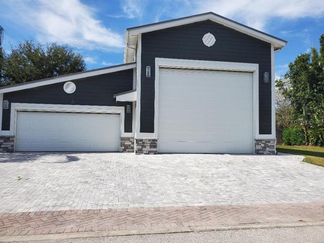 Beautiful custom RV garage/port, 2 car garage and Carriage house
