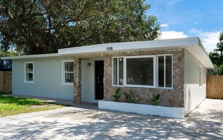 Front of Home with parking for 3-4 cars