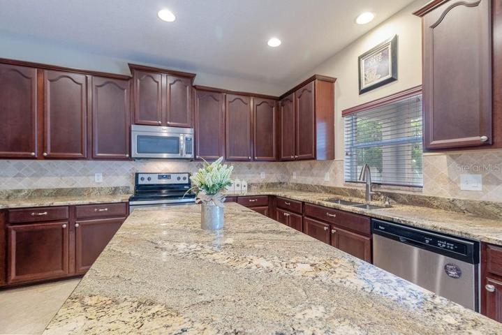 Center island with gorgeous upgraded granite