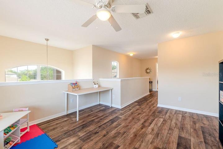 Loft view to the laundry room and main suite