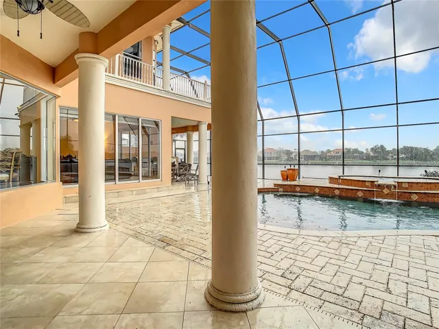 10549 Cory Lake Dr, view of pool from ground floor lanai