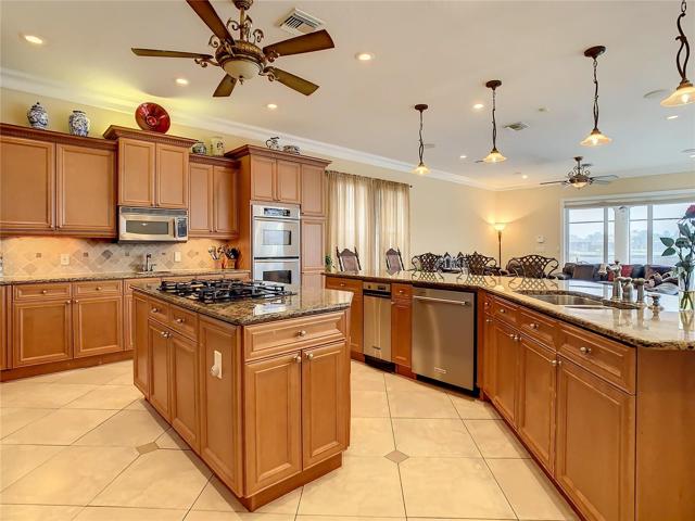10549 Cory Lake Dr, kitchen view toward great room
