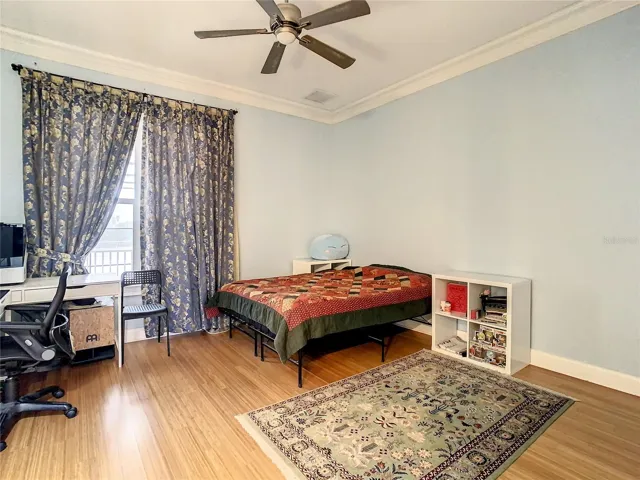 10549 Cory Lake Dr, second floor, bedroom 4, view of pool and lake
