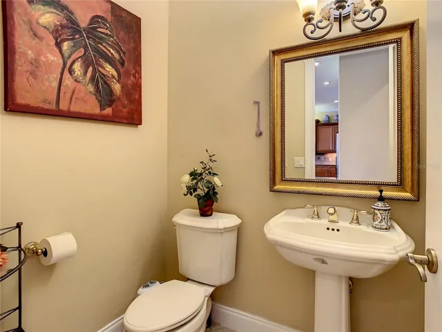 10549 Cory Lake Dr, half bath off kitchen and Great Room area