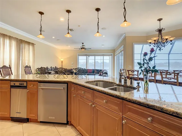 10549 Cory Lake Dr, kitchen, view toward great room, pool and lake