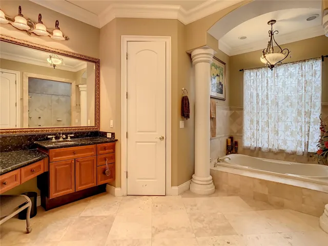 10549 Cory Lake Dr, ground floor owner's suite bath, jacuzzi tub