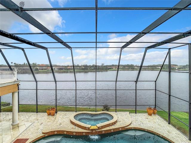 10549 Cory Lake Dr, pool and spa, view of Cory Lake from second floor veranda
