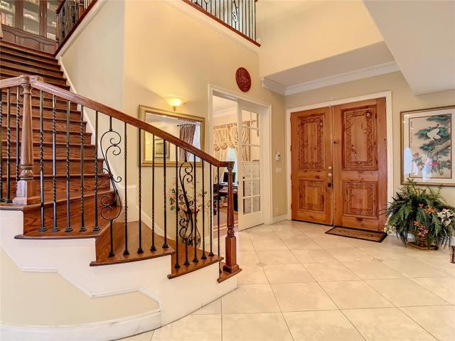 10549 Cory Lake Dr, entry hall, view toward entry doors, office and main stairway