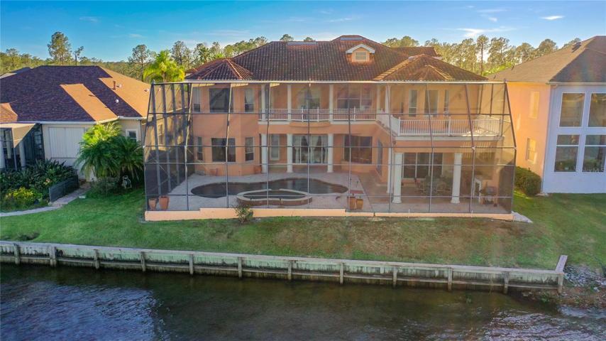 10549 Cory Lake Dr view of house from lake