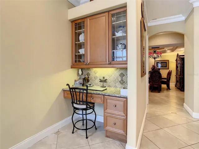 10549 Cory Lake Dr, built in desk adjacent to kitchen and casual dining area